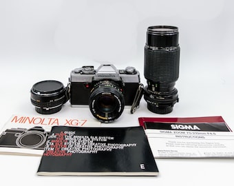 Minolta XG-7 with Minolta 50mm F1.7 Prime, SIGMA Zoom 70-210mm F/4.5 Macro, 2X Converter.
