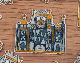 Parche termoadhesivo de la fachada de It's a Small World - Chaqueta, mochila y gorra de Disney Ride DLAND