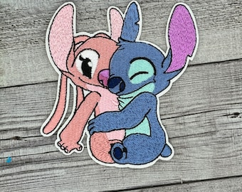 Parche termoadhesivo de Angel & Stitch Hug - 626 lilo alien stitch 2026 Envío 4/21