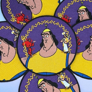 May include: Circular embroidered patches featuring a cartoon character with a yellow shirt and a purple background. The patches have a gold border and depict the character with various other cartoon figures. The patches are likely for clothing or accessories.
