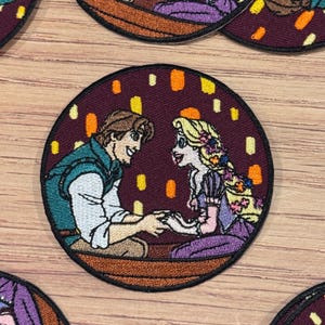 Flynn & Rapunzel-strijkpatch - prinses, jas, rugzak, hoed, verwarde lantaarn