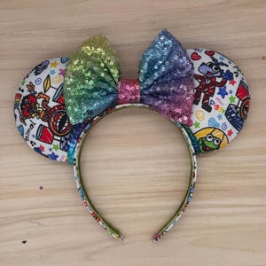 Muppets Mouse Ears: Rainbow Sequin Bow - Hollywood Studios