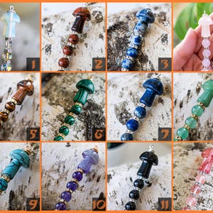May include: Twelve different crystal mushroom charms, each with a different color and type of crystal. The charms are strung on a silver chain with small beads.