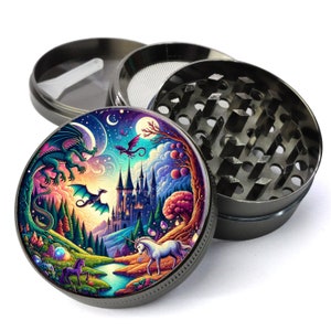 May include: A metal grinder with a colorful design featuring a unicorn, a dragon, and a castle in a fantasy landscape. The grinder has a three-piece design with a top lid, a grinding chamber, and a bottom catch.