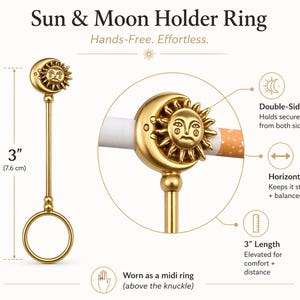 May include: Gold-colored Sun & Moon holder ring, 3 inches (7.6 cm) long. The ring features a sun and moon design, a double-sided clip, and is worn as a midi ring. The text on the image says "Hands-Free. Effortless."