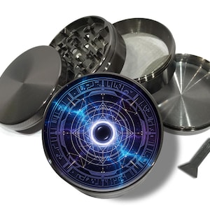 May include: A disassembled metal herb grinder with a celestial design. The grinder comprises a lid, grinding chamber, mesh screen, and base. The top piece has a circular design with a blue and purple galaxy pattern. A small scraper is included.