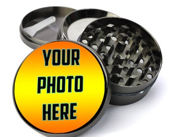 May include: A black metal grinder with a round, yellow and orange lid that says "YOUR PHOTO HERE".