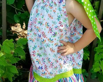 Adorable girls sundress. Ruffled pillowcase style sundress/top. Butterfly print designer cotton fabric. Orange, aqua, blue, lime green
