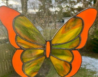 Stained Glass Butterfly Suncatcher, sparkling green and opaque orange