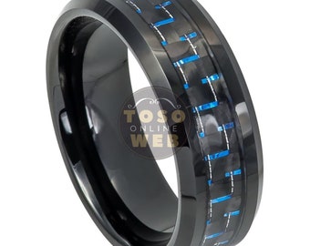 May include: Black tungsten carbide ring with a blue and black carbon fiber inlay.