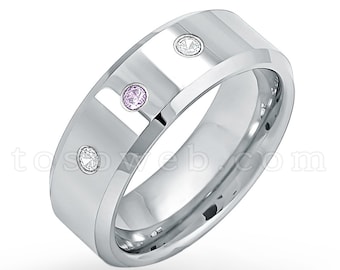 May include: A silver wedding band with three gemstones. The band has a beveled edge and a polished finish. The gemstones are a pink sapphire and two white diamonds.