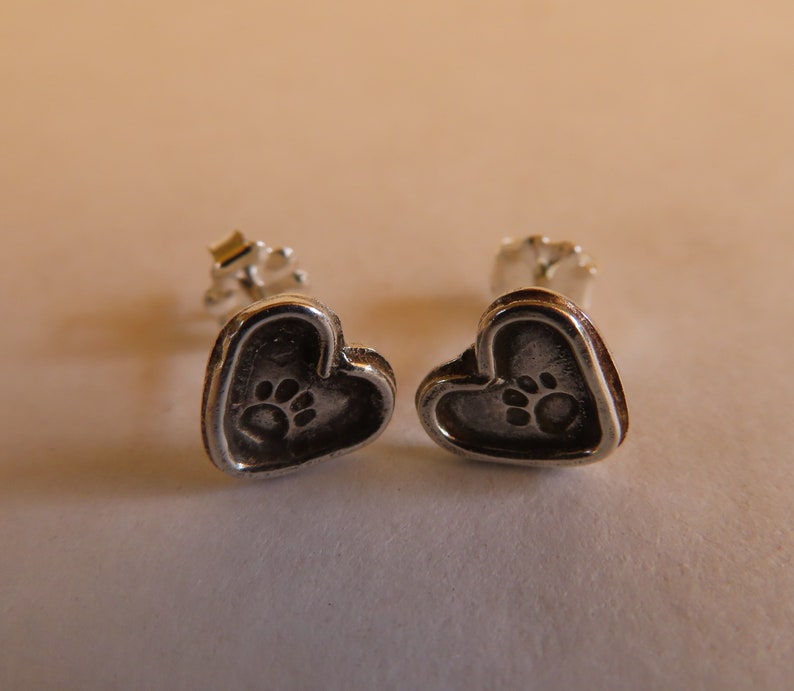 Pawfect Charm Heart Paw Cutout Stud Earrings