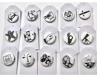 Random and fun handmade 1.25” black & white button badge pins
