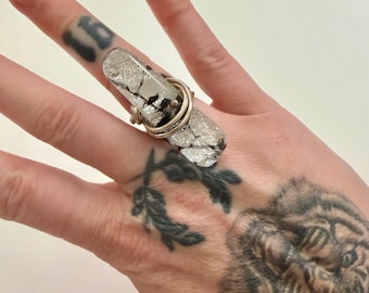 Retro rutilated quartz statement ring set in a split sterling silver band