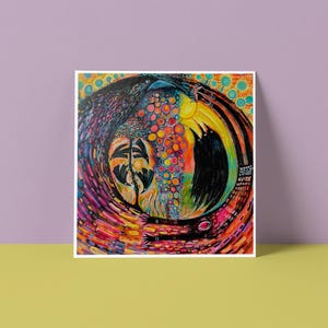 May include: Colorful abstract artwork featuring a circular design with a bird-like figure on one side and a sun-like shape on the other. The artwork uses a vibrant palette of colors, including red, orange, yellow, and blue, with a black background.