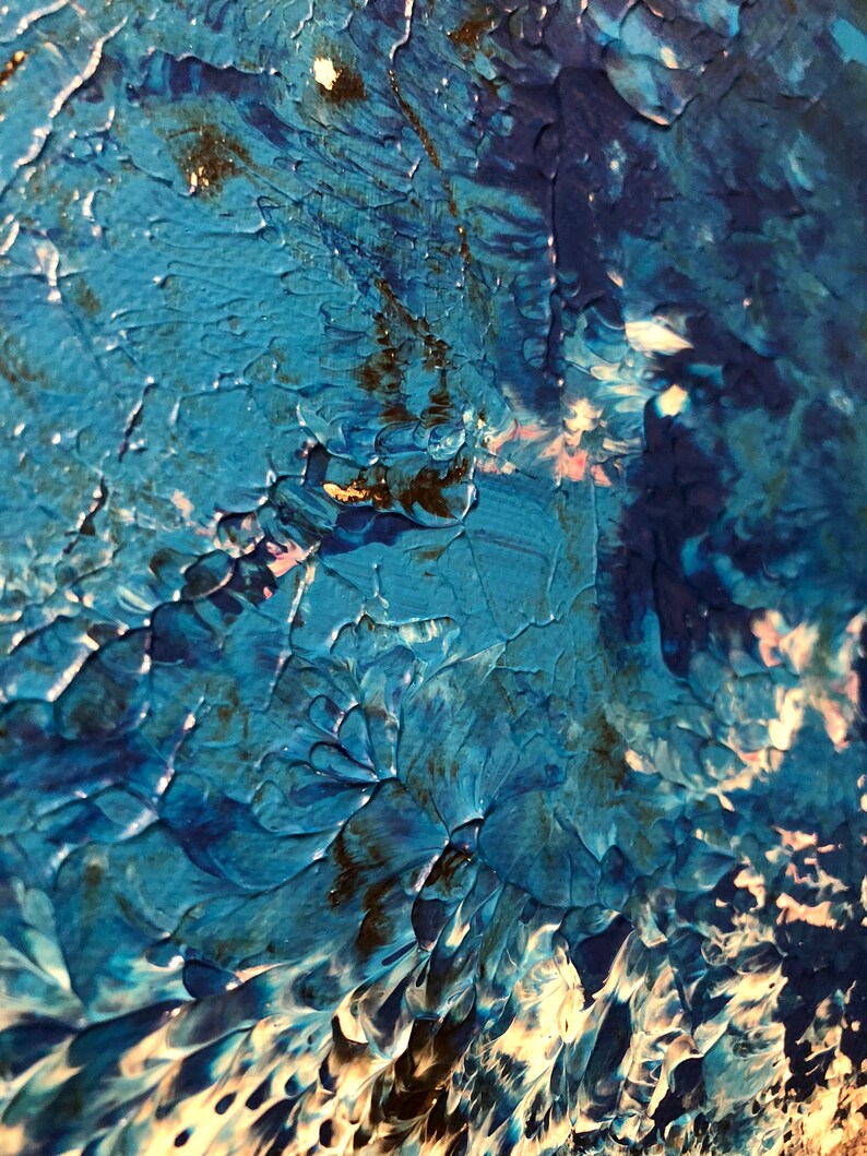 May include: Abstract painting with blue, white, and black paint. The paint is applied in thick layers, creating a textured surface. The colors are blended together to create a swirling effect.