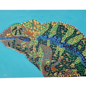 May include: An abstract painting of a chameleon on a turquoise background. The chameleon is made up of small, colourful squares and triangles, creating a mosaic-like effect.