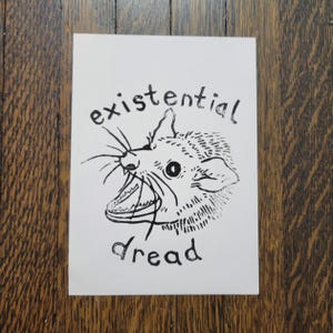 Handmade Existential dread screaming possum lino print