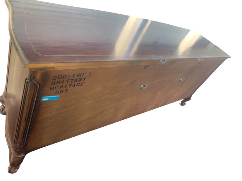 May include: The back of a wooden cabinet with a label that reads "206-140 | Brittany Heritage 685".