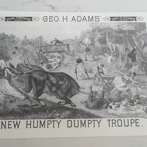 May include: Black and white illustration of a group of people performing in a circus. The illustration features a bull, a clown, a woman in a tutu, and other performers. The text "NEW HUMPTY DUMPTY TROUPE." is at the bottom of the image.