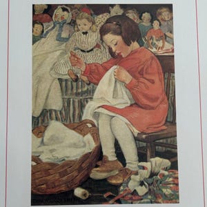 May include: An illustration of a young girl in a red dress seated on a wooden chair, sewing white fabric. A wicker basket and a spool of thread are in the foreground. Dolls are in the background.