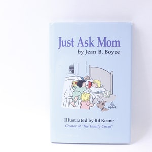 May include: A blue book cover with the title "Just Ask Mom" by Jean B. Boyce. The cover features a black and white illustration of a family in bed with a dog.