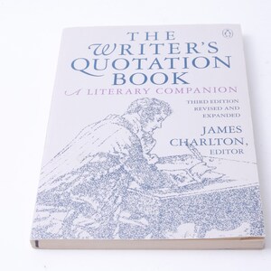 May include: A book titled "The Writer's Quotation Book: A Literary Companion" by James Charlton, editor. The book cover features a black and white illustration of a person writing at a desk.