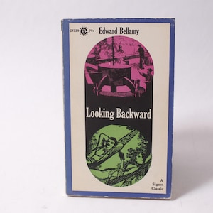 May include: A vintage paperback book titled "Looking Backward" by Edward Bellamy. The cover features a black background with the title in white, and illustrations in pink and green. The book has a blue border.