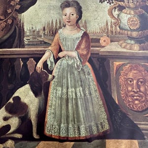 May include: An oil painting depicting a child in a rust-colored dress with a white lace apron and pearl necklace, standing on a checkered floor. A brown and white dog sits beside the child, while a large stone urn with flowers stands nearby.