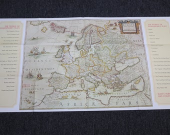 May include: An antique map of Europe with a title card that reads "Europa" and a list of Shakespeare's plays on the right side of the map. The map is printed on a white background with brown and black lines and text. The map is surrounded by a white border.