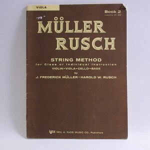May include: Book cover for the "Müller Rusch String Method" for violin, viola, cello, and bass. The book is brown with gold lettering and is labeled "Book 2, Lessons 31-60".