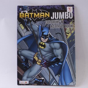 May include: A coloring and activity book featuring Batman, a superhero in a blue cape and gray suit, hanging from a rope in a city setting. The book cover has the title "Batman Jumbo Coloring & Activity Book" and the number "1" in a red circle.