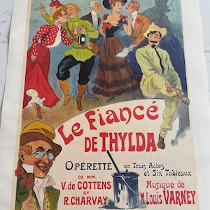 Puede incluir: Un cartel vintage que anuncia la opereta "Le Fiancé de Thylda" en el Théâtre Cluny. El cartel presenta una ilustración colorida de un grupo de personas en un escenario teatral. El texto del cartel dice "Le Fiancé de Thylda", "Opérette", "De MM. V. de Cottens et R. Charvay", "En Trois Actes et Six Tableaux", "Musique de M. Louis Varney", y "Théâtre Cluny".