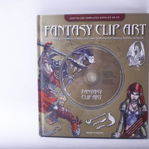 May include: A gold book with the title "Fantasy Clip Art" and a CD with the same title. The book cover features a fantasy illustration of a warrior, a dragon, and a female elf. The text on the cover reads "Everything you need to create your own professional-looking fantasy artwork."