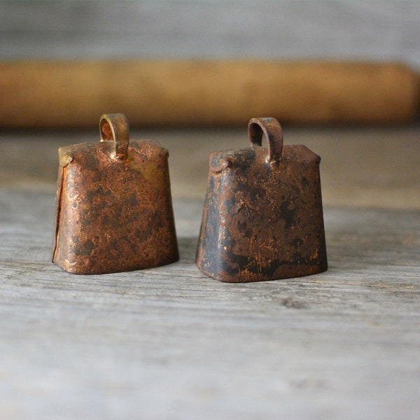 Charming antique hammered bell, bronze, brass, farm garden country house decoration, forged bell, rustic decoration