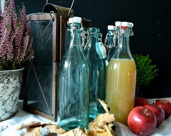 Ancient glass bottles with porcelain lids, blue glass bottles, swing top, ceramic lids, shabby, brocante, antique bottles