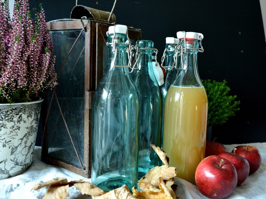 Ancient glass bottles with porcelain lids, blue glass bottles, swing tops, ceramic lids, shabby, brocante, antique bottles