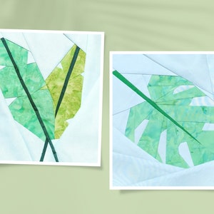 May include: Two paper pieced leaf designs, one with two green leaves and one with a single green leaf. Both are on a white background.