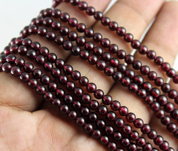 JADE RED GEMSTONE BEADS approx 39CM string x 8mm beads