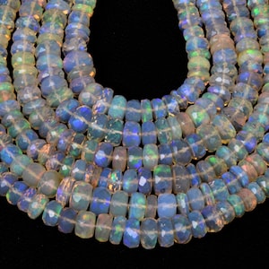 Faceted Ethiopian Opal Beads: Blue Fire Roundel, 16 Inch Strand