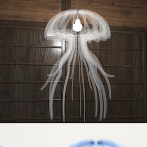 May include: Three jellyfish-shaped lamps in different colors: purple, blue, and green. The lamps are made of translucent plastic and have a light bulb inside. The lamps are on a white background.