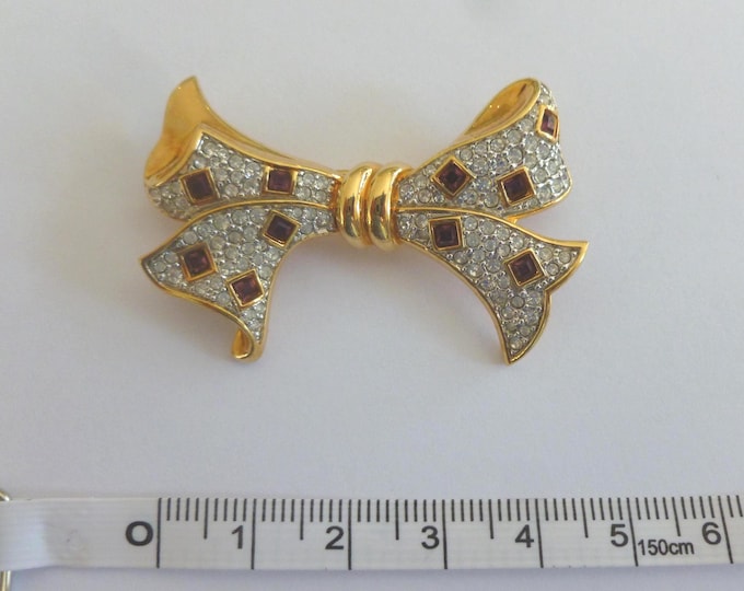 Bow Shaped Brooch, vintage, quality, goldtone, red and white stones