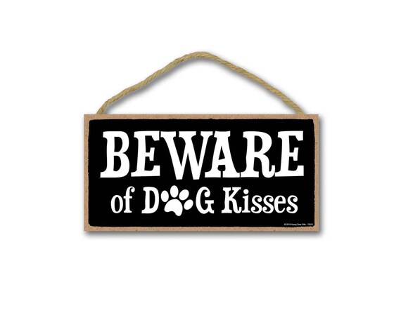 beware of dog kisses sign