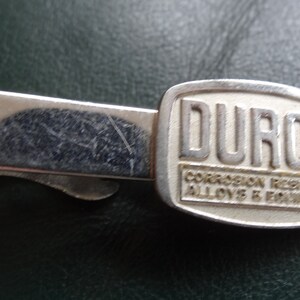 Small Dayton Ohio Silvertone Duriron Durco Corrosion Resisting Alloys Equipment Tie Tack Clip