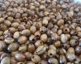 Perles de Terre Sainte en bois d'olivier 9 x 7 mm ovales en 9 x 7 mm /bois d'olivier / poli/ qualité PREMIUM et prix les plus bas