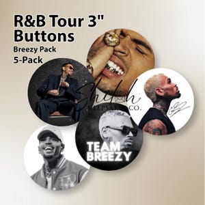 May include: A set of five 3-inch round buttons featuring images of Chris Brown. The buttons are part of the "R&B Tour" collection and are labeled as the "Breezy Pack." The buttons display various black and white and color images of the artist.