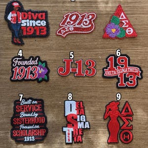 May include: A collection of nine embroidered patches featuring red, white, and black designs with Greek letters, the year 1913, and various phrases including Diva since 1913, Founded 1913, Built on Service, Bound by Sisterhood, Focused on Scholarship, and Delta Sigma Theta.