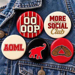 May include: Five circular pinback buttons featuring various designs: a red and white striped button with the text OO OOP, a cream button with the text MORE THAN A SOCIAL CLUB, a cream button with the text AOML, a black button with a red elephant, and a red button with a hand gesture graphic.