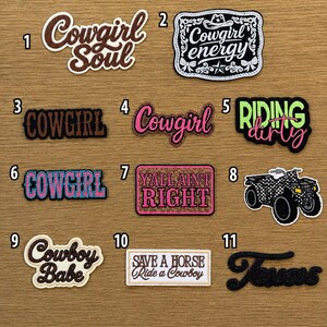 May include: A collection of eleven embroidered patches featuring various designs and text including Cowgirl Soul, Cowgirl energy, COWGIRL, Riding dirty, YALL AIN'T RIGHT, Cowboy Babe, SAVE A HORSE Ride a Cowboy, Texas, and a black and white checkered ATV.