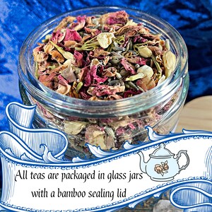 May include: A glass jar filled with dried rose petals, lavender, and other herbs. The jar has a bamboo lid. All teas are packaged in glass jars with a bamboo sealing lid.